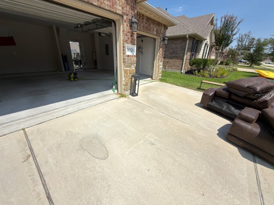 Leather sectional sofa carried out to the driveway during a garage clean-out