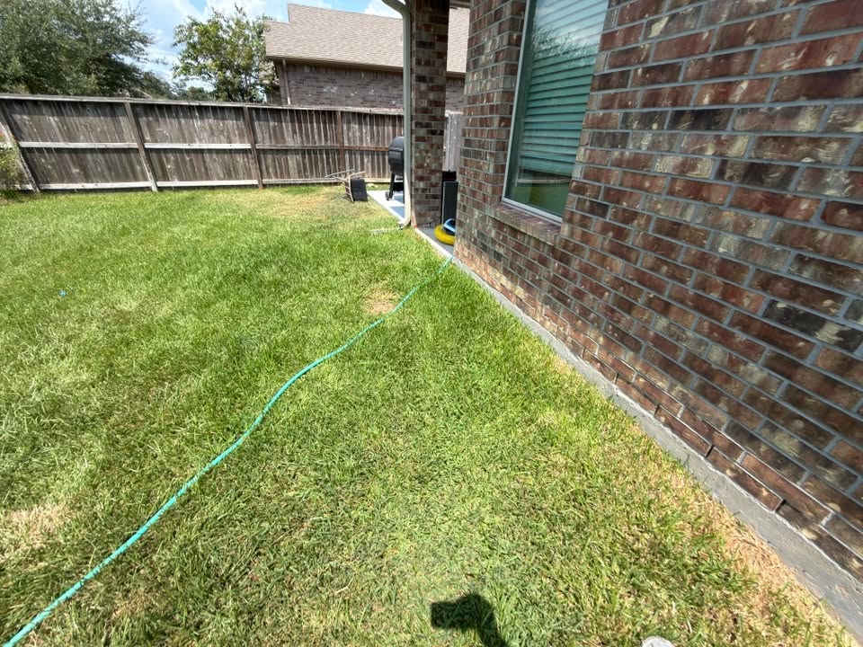 The same Houston back yard, clear and clean after the haul-off